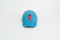 blue dad hat xochipilli BORN IN 69