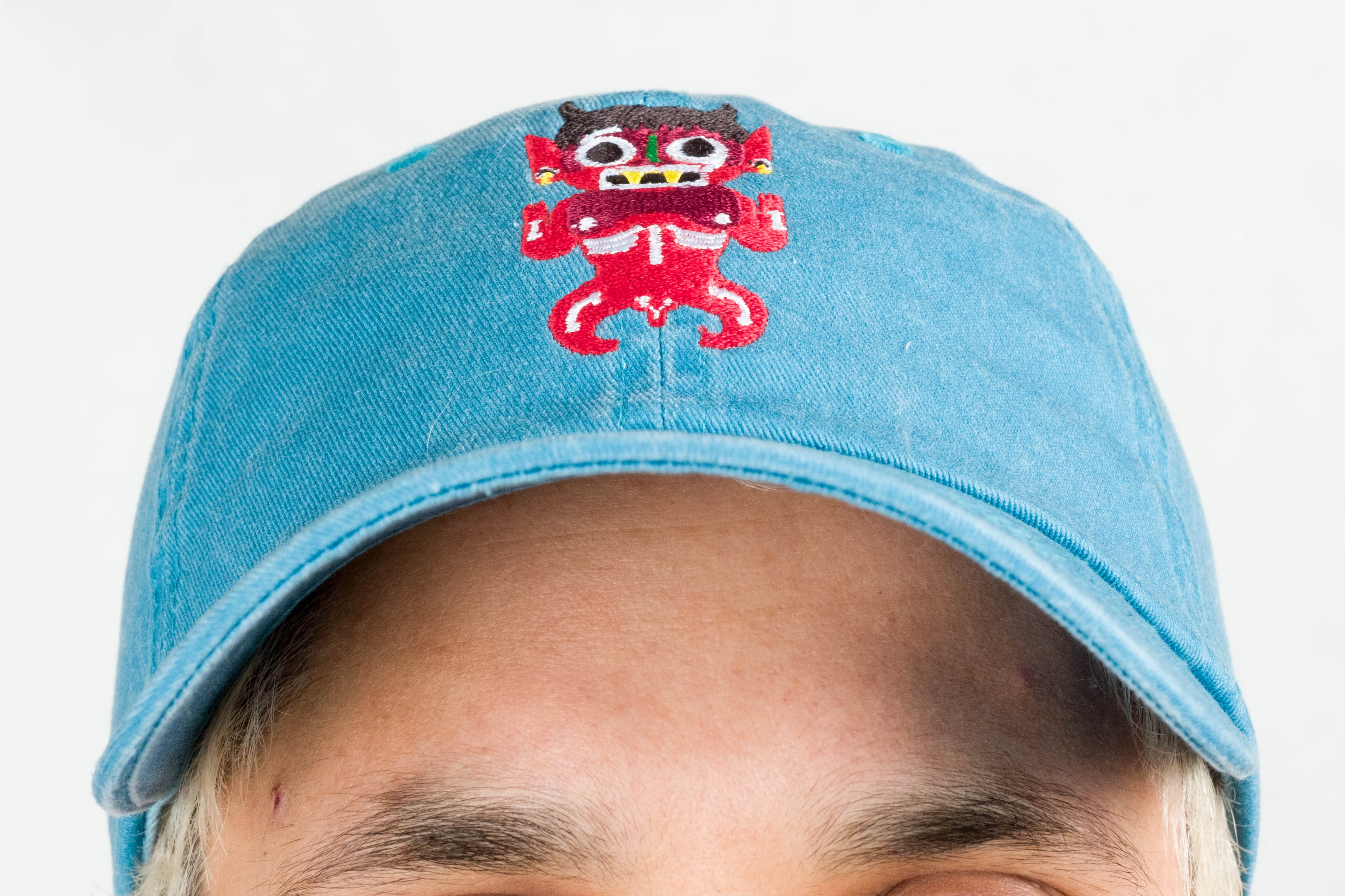 blue dad hat xochipilli BORN IN 69