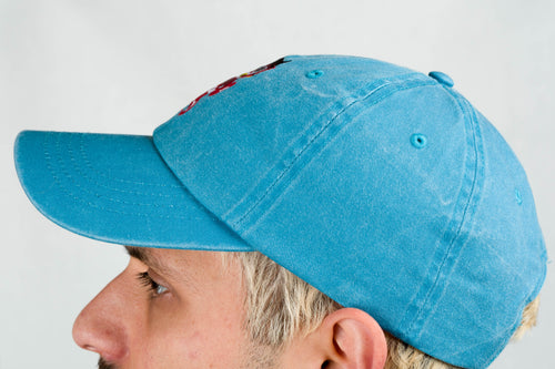 blue dad hat xochipilli BORN IN 69