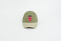 green dad hat xochipilli BORN IN 69