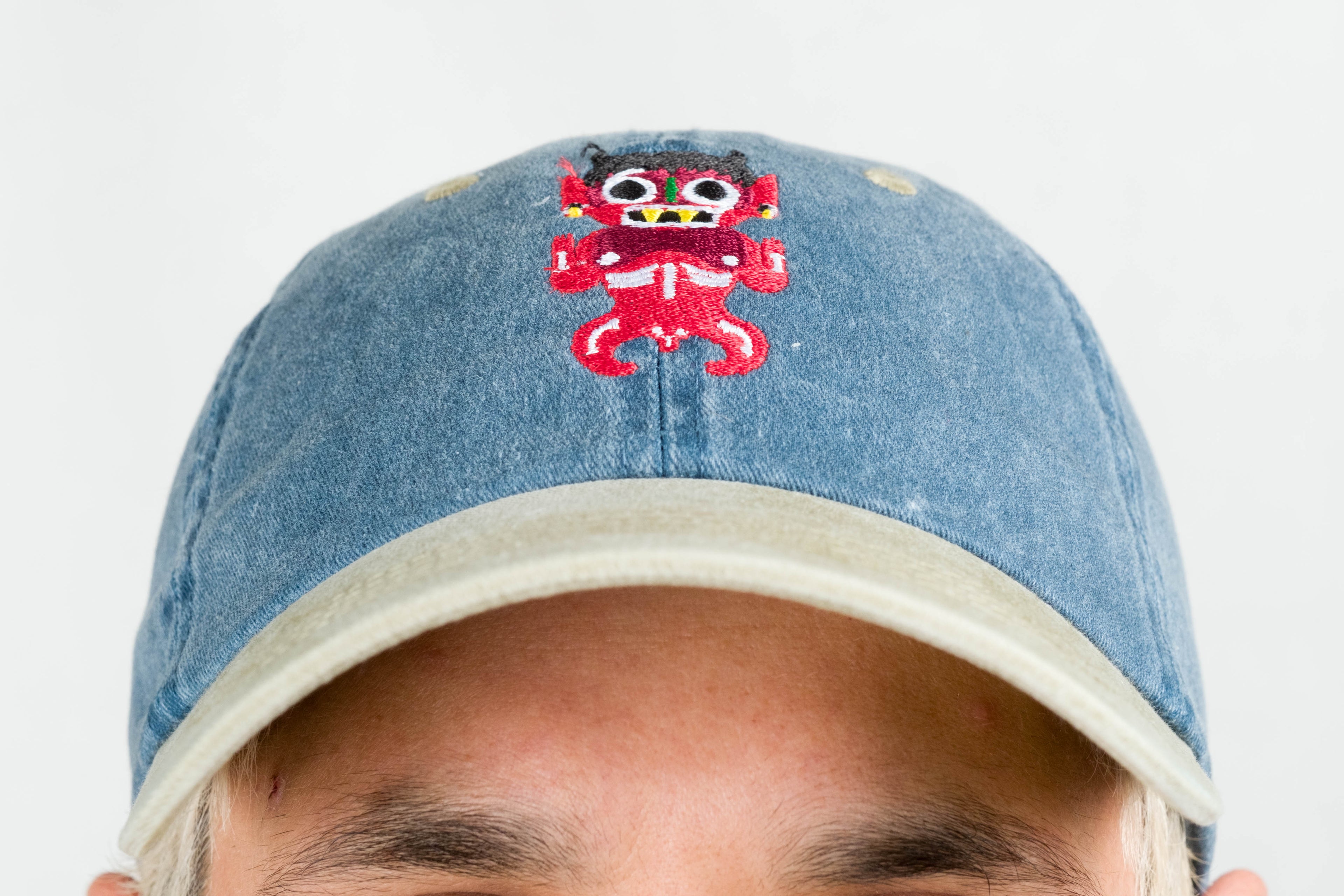 navy blue dad hat xochipilli BORN IN 69